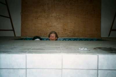 Leslie in the baptismal font (4/12/02)