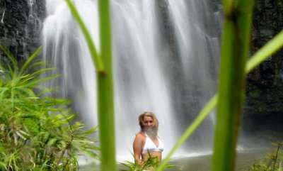 Swimming in Opeaka Falls (150' waterfall).  Wailua, Kauai