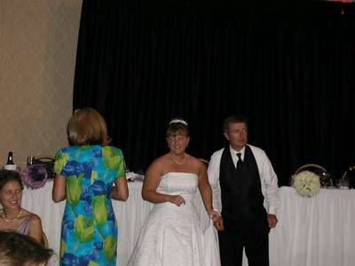 Dad and I watching Dave dance with his mother.