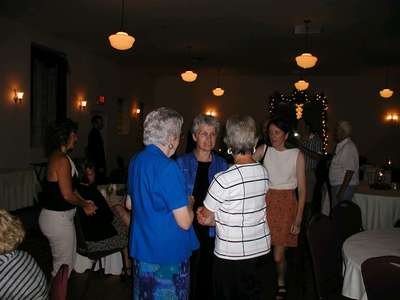 The Johnson family enjoying their time together at the rehearsal dinner.