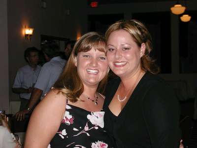 Bridesmaid Lisa and I taking time out to pose for the camera at the rehearsal dinner.