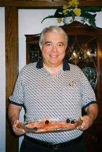 Miriam's father, Mike, with a big plate of lox.