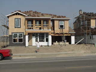 Things feel a little like they're crawling for us, but we know that's not the case.  They've begun wrapping the house to get ready for the stucco.