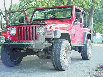 Our slightly muddy Jeep...we love to off-road!