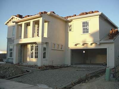 Sept 5..our stucco has been colored and more work is progressing on the inside.  We should have our driveway and sidewalk shortly