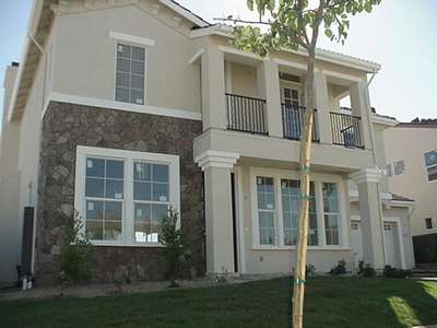 Sept. 22.  Another shot of the front.  We have the landscaping almost done and only the appliances and carpet are needed on the interior!!!!