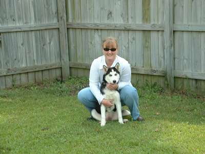 Skye and I playing in the backyard at the house in NC. FYI, the dog has more space to live and play in then Dave and I have.